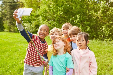 Children posing for a selfie.jpg