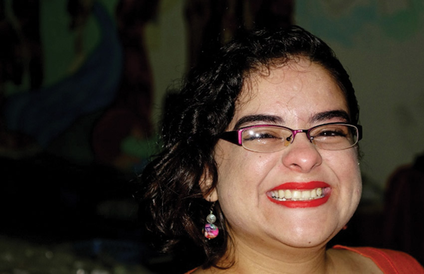 Woman smiles after dental care